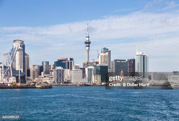 auckland skyline in new zealand largest city - commercial bay auckland stock pictures, royalty-free photos & images