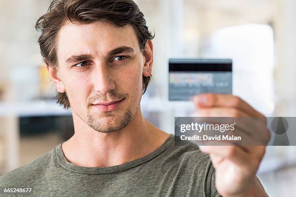 Man Is Using Creadit Card 1,273 Man Hold Credit Card Front View Stock Photos, High-Res Pictures ...