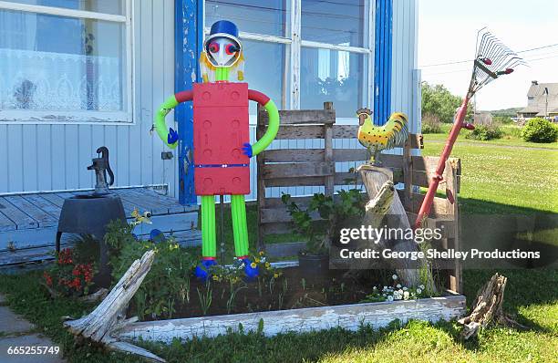 bizarre robot like scarecrow - scarecrow faces foto e immagini stock