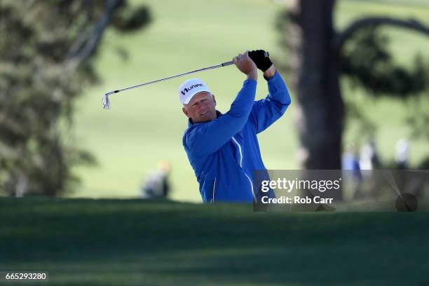 Sandy Lyle of Scotland plays a shot on the first hole during the first round of the 2017 Masters Tournament at Augusta National Golf Club on April 6,...