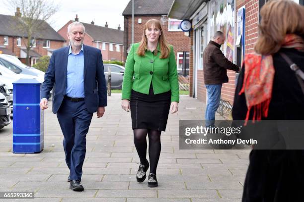 Leader of the Labour Party Jeremy Corbyn MP and Shadow Secretary for Education Angela Rayner arrive to visit a children's holiday club in Leyand to...