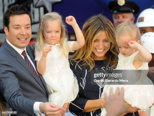 Jimmy Fallon , his wife Nancy Juvonen and daugthers Winnie and Frances greet the audience during the Grand Opening of Universal Orlando's Newest...