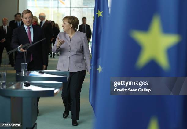 German Chancellor Angela Merkel and Irish Prime Minister Enda Kenny arrive to speak to the media at the Chancellery on April 6, 2017 in Berlin,...