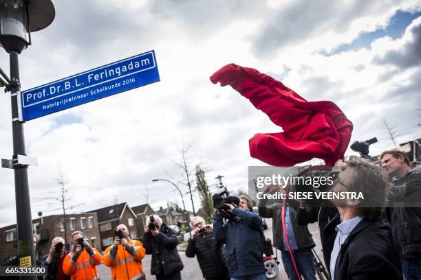 Dutch scientist Bernard Lucas "Ben" Feringa , the 2016's Nobel Peace Prize laureate in Chemistry, attends a ceremony to unveil the plaque of a street...