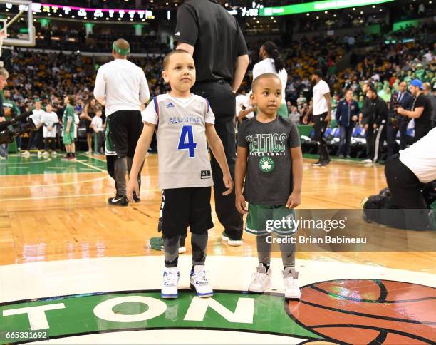 James and Jaiden, sons of Isaiah Thomas of the Boston Celtics takes in the views prior to the game against the Cleveland Cavaliers on April 5, 2017...