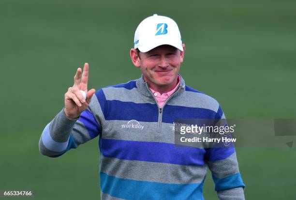 Brandt Snedeker of the United States celebrates making a putt for birdie on the second hole during the first round of the 2017 Masters Tournament at...