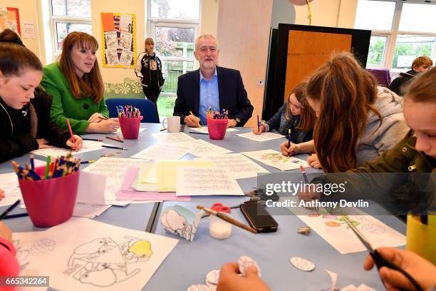 Leader of the Labour Party Jeremy Corbyn MP and Shadow Secretary for Education Angela Rayner join a craft workshop during a visit to a children's...