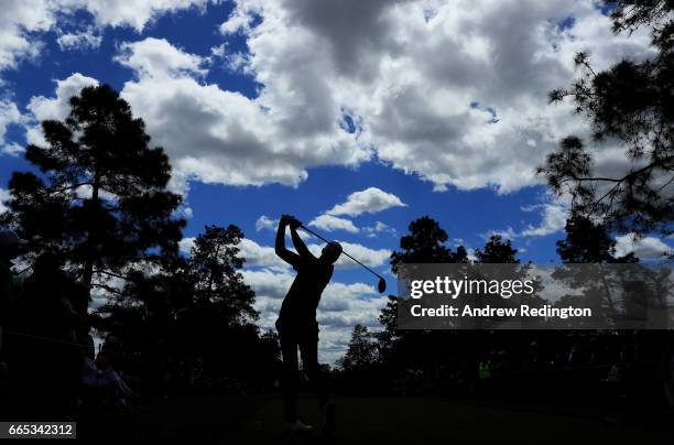 Daniel Berger of the United States plays his shot from the ninth tee during the first round of the 2017 Masters Tournament at Augusta National Golf...