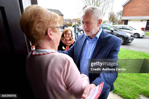 Leader of the Labour Party Jeremy Corbyn MP greets local resident Catherine Finney as he canvasses with local Labour candidate Gail Hodson for the...