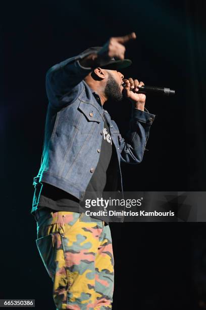 Hip-hop artist Talib Kweli performs on stage during WE Day New York Welcome to celebrate young people changing the world at Radio City Music Hall on...