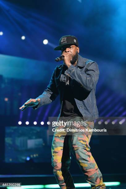Hip-hop artist Talib Kweli performs on stage during WE Day New York Welcome to celebrate young people changing the world at Radio City Music Hall on...