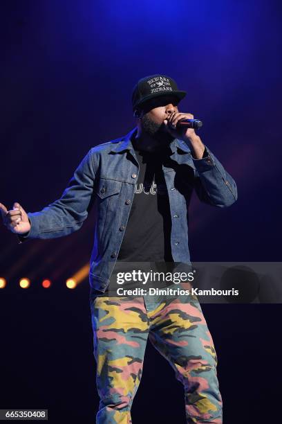 Hip-hop artist Talib Kweli performs on stage during WE Day New York Welcome to celebrate young people changing the world at Radio City Music Hall on...