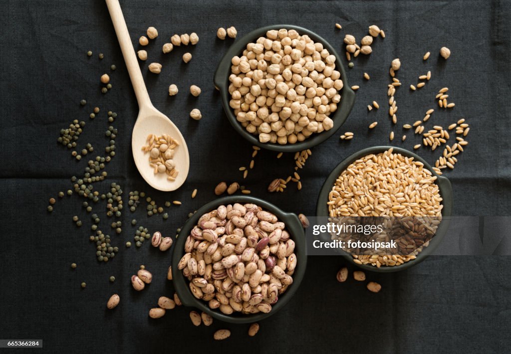 Legume family in the black bowls on the table