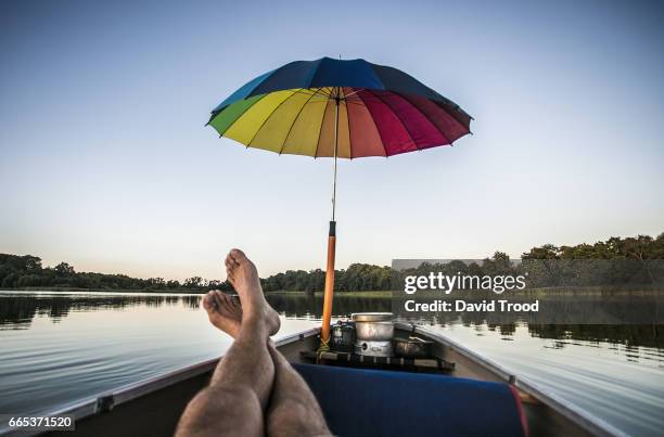 relaxing in a canoe - hillerød stock pictures, royalty-free photos & images