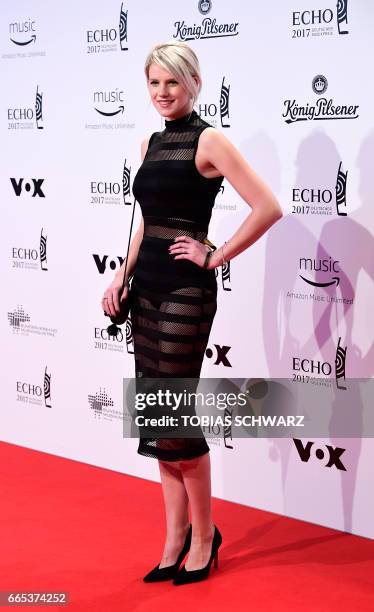 German singer Levina arrives for the 2017 Echo Music Awards in Berlin, on April 6, 2017. / AFP PHOTO / Tobias SCHWARZ