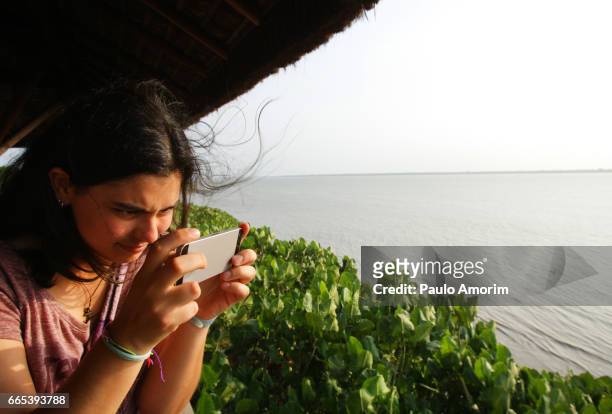 a youg girl enjoying at amazon in brazil - amazon jungle girl stock pictures, royalty-free photos & images