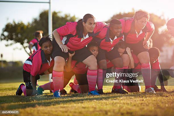 Rugby players lined up at practice