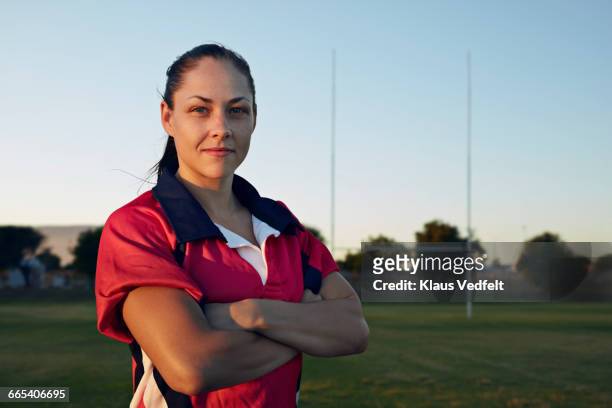 portrait of female rugby player - rugby sport stock-fotos und bilder