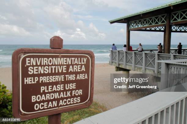 An environmentally sensitive area sign on a public beach in Boca Raton.