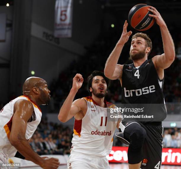 Nicolo Melli, #4 of Brose Bamberg competes with Ege Arar, #11 of Galatasaray Odeabank in action during the 2016/2017 Turkish Airlines EuroLeague...