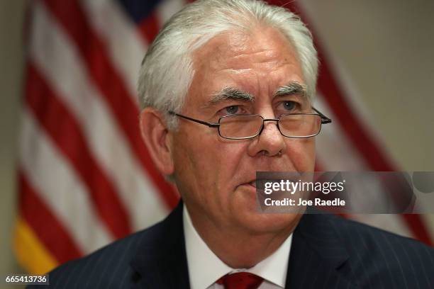 Secretary of State Rex Tillerson speaks with the media after he greeted Chinese President Xi Jinping at Palm Beach International Airport on April 6,...