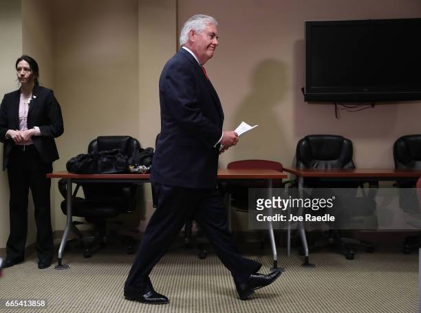 Secretary of State Rex Tillerson arrives a press conference after he greeted Chinese President Xi Jinping at Palm Beach International Airport on...