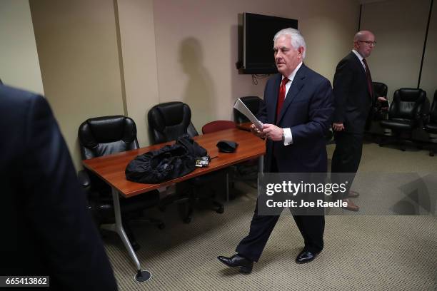 Secretary of State Rex Tillerson exits his press conference after he greeted Chinese President Xi Jinping at Palm Beach International Airport on...