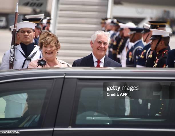 Secretary of State Rex Tillerson and his wife Renda St. Clair wait to greet the President of the People's Republic of China Xi Jinping and his wife...