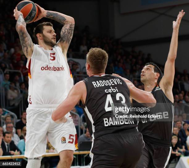 Vladimir Micov, #5 of Galatasaray Odeabank Istanbul competes with Nikos Zisis, #6 of Brose Bamberg in action during the 2016/2017 Turkish Airlines...