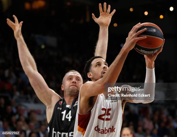 Austin Daye, #25 of Galatasaray Odeabank Istanbul competes with Vladimir Veremeenko, #14 of Brose Bamberg in action during the 2016/2017 Turkish...