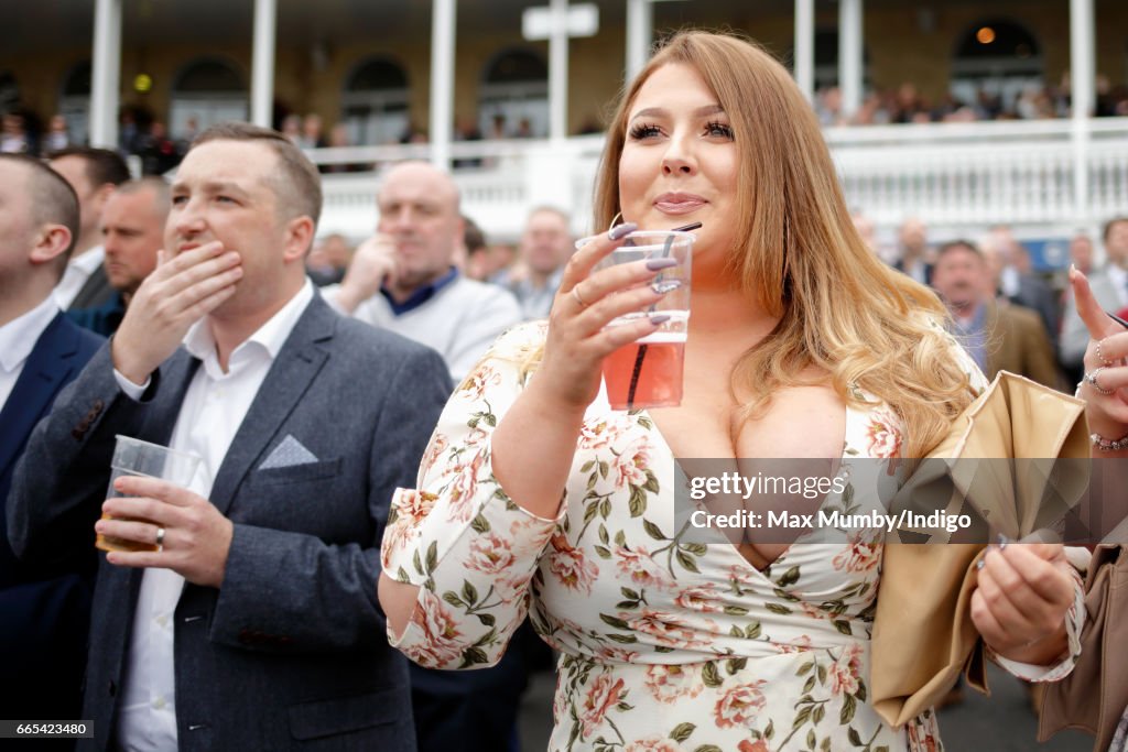 Racegoers Attend The Randox Health Grand National Festival - Day One