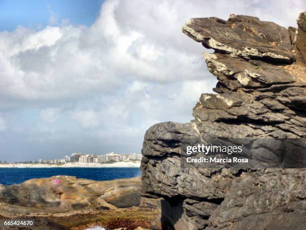 city, rocks and clouds - nublado stock pictures, royalty-free photos & images