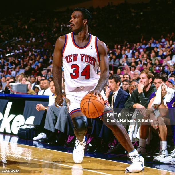 Charles Oakley of the New York Knicks drives against the Utah Jazz on October 21, 1994 at Madison Square Garden in New York City, New York. NOTE TO...