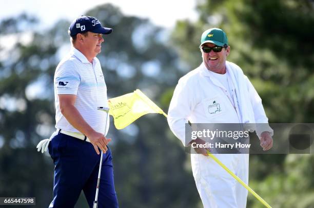 Jason Dufner of the United States smiles as he saves par on the 17th hole during the first round of the 2017 Masters Tournament at Augusta National...