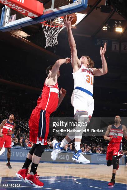 Ron Baker of the New York Knicks goes up for a lay up during a game against the Washington Wizards n April 6, 2017 at Madison Square Garden in New...