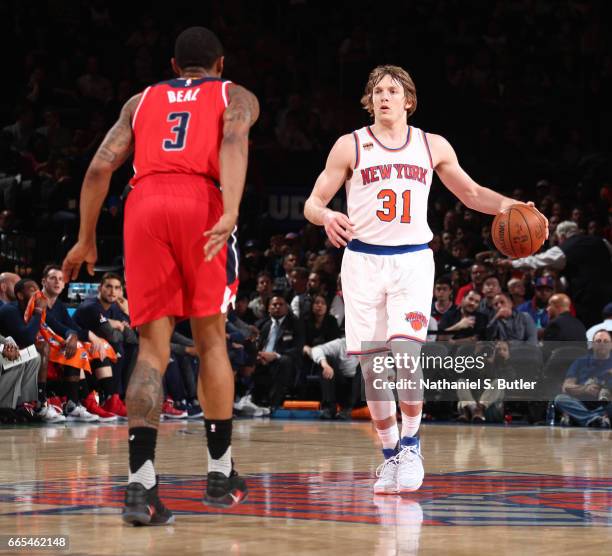 Ron Baker of the New York Knicks handles the ball during a game against the Washington Wizards on April 6, 2017 at Madison Square Garden in New York...