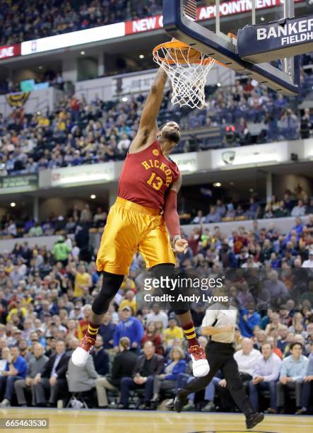 Paul George of the Indiana Pacers dunks the ball against the Milwaukee Bucks at Bankers Life Fieldhouse on April 6, 2017 in Indianapolis, Indiana....