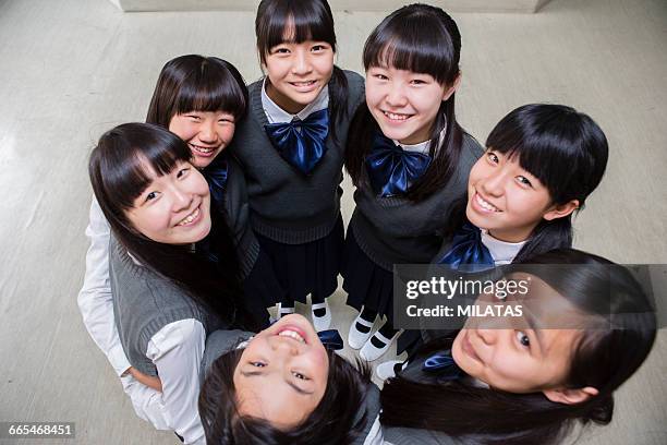 japanese female students form a circle - surrounding ストックフォトと画像
