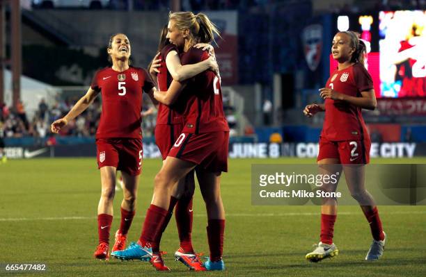 Allie Long of the U.S. Celebrates with Rose Lavelle, Kelley O'Hara and Mallory Pugh during the first half of the International Friendly soccer match...