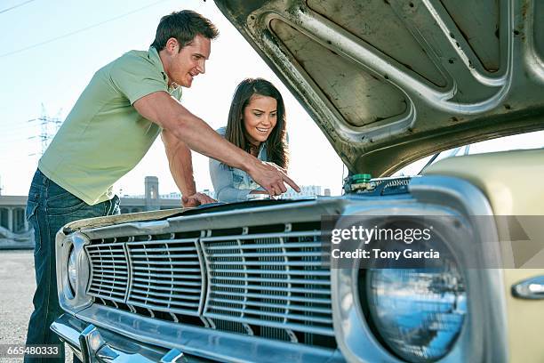Couple (Mechanics) Photos and Premium High Res Pictures - Getty Images