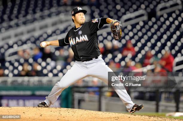 Junichi Tazawa of the Miami Marlins pitches in the eighth inning against the Washington Nationals at Nationals Park on April 6, 2017 in Washington,...