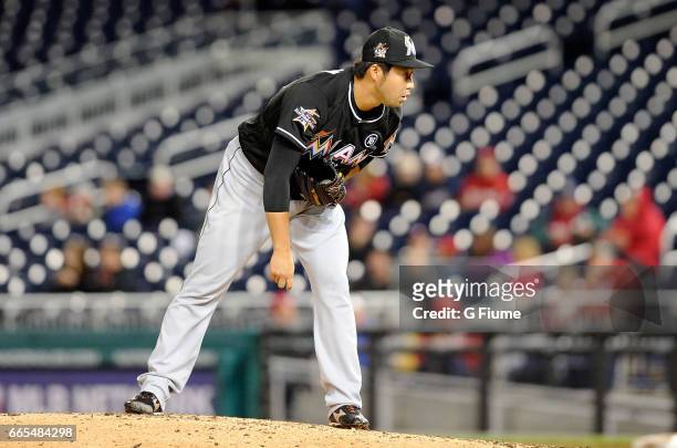 Junichi Tazawa of the Miami Marlins pitches in the eighth inning against the Washington Nationals at Nationals Park on April 6, 2017 in Washington,...