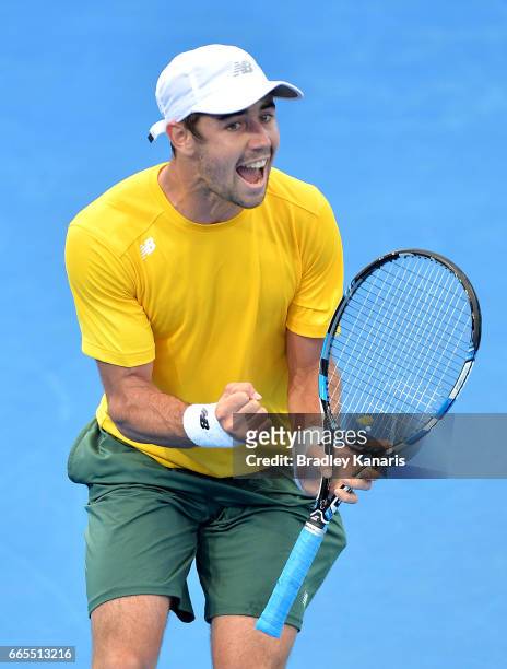 Jordan Thompson of Australia celebrates winning a point in his match against Jack Sock of the USA during the Davis Cup World Group Quarterfinals...