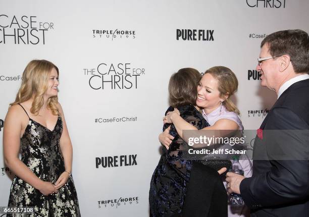 Kelly Lamor Wilson, Leslie Strobel, Erika Christensen, and Lee Strobel attend the Case For Christ Premiere at AMC River East Theater on April 6, 2017...