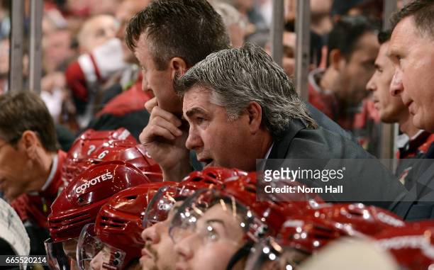 Head coach Dave Tippett of the Arizona Coyotes watches third period action against the Vancouver Canucks at Gila River Arena on April 6, 2017 in...