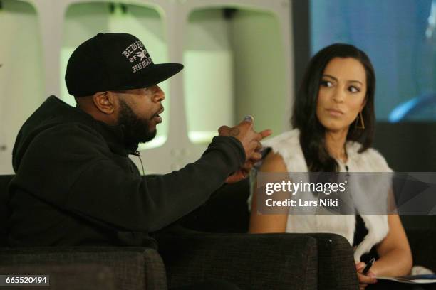 Hip Hop Artist Talib Kweli and Commentator Angela Rye attend the BET Music Presents: Us Or Else panel discussion at the Viacom White Box Hall on...