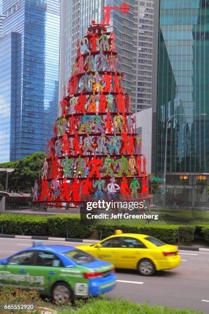 Sculpture by artist David DuDu Gerstein in the central business financial district at Raffles Place.