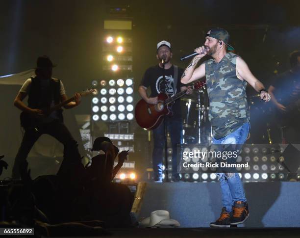 Preston Burst and Chris Lucas of LoCash performs during Day 1 - Country Thunder Music Festival Arizona on April 6, 2017 in Florence, Arizona.