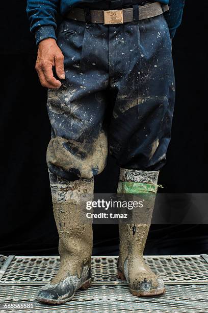 workboots of concrete craftsman 50s - work boot stock pictures, royalty-free photos & images