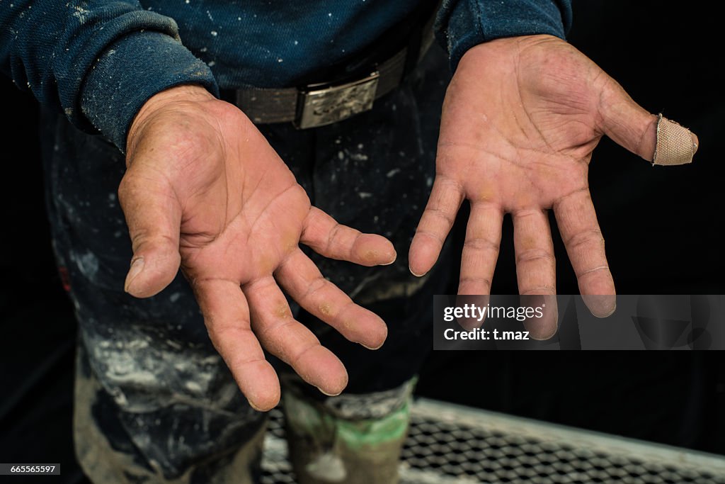 Hands of Concrete craftsman 50s